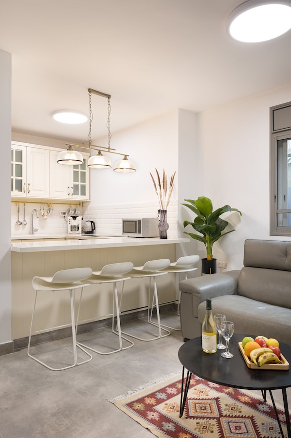 Apartment | Private kitchen | Full-size fridge, microwave, oven, stovetop