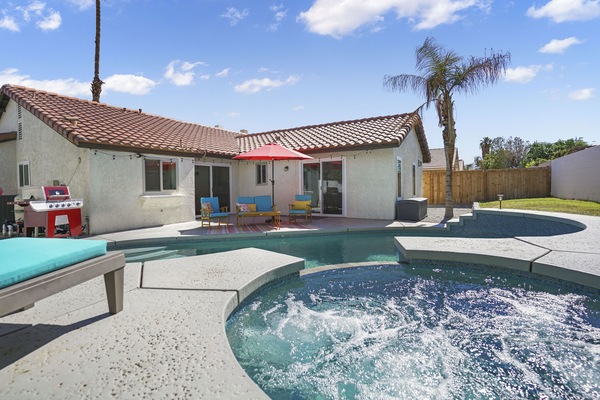 Let our bubbling hot tub soothe your soul!