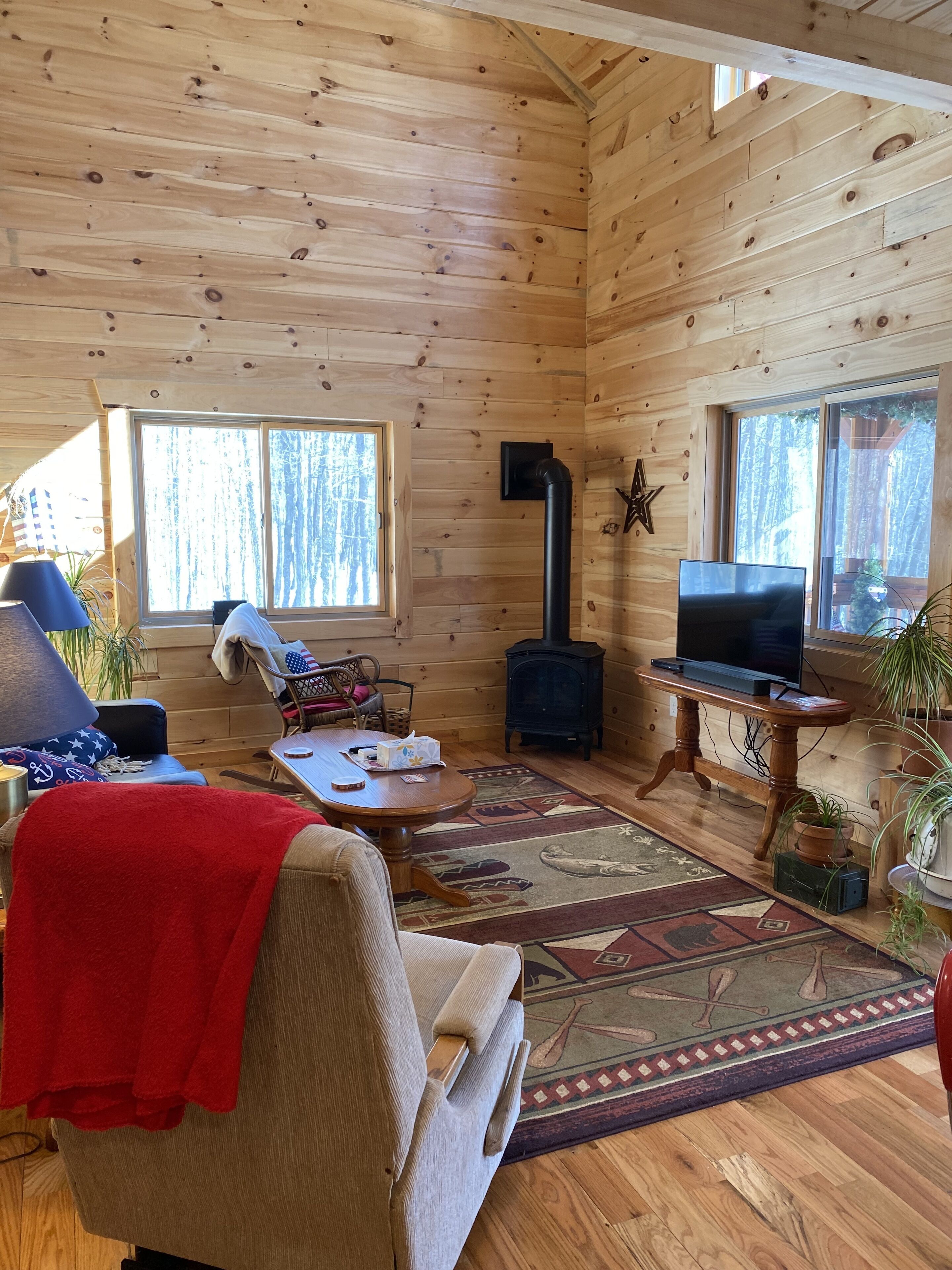 Family log home nestled in the woods just minutes from trails.