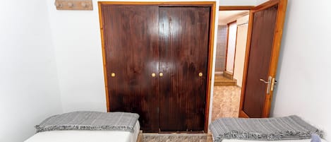 4 bedrooms, iron/ironing board, travel cot, WiFi