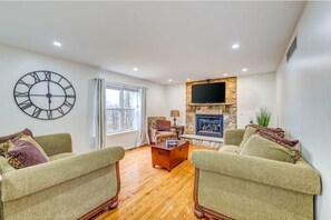 Smart TV, fireplace, foosball, books