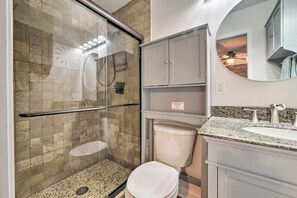 Combined shower/tub, hair dryer, towels, toilet paper