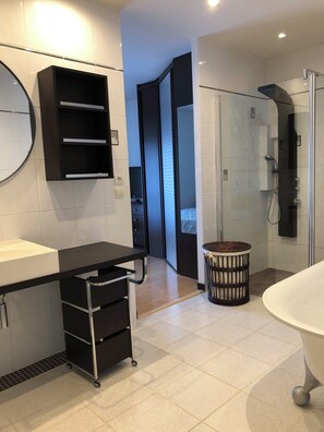 Shower, towels, toilet paper