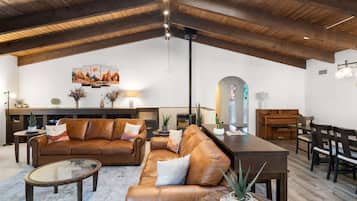 Smart TV, fireplace, books, offices