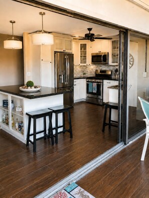 Coffee/tea maker, fridge, microwave, oven