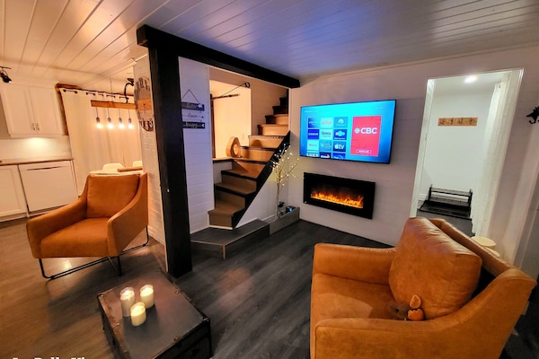 Smart TV, fireplace, foosball, books