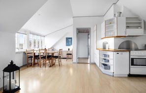 Enjoy meals in the kitchen with an oven and dining area.
