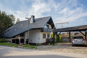 Alpine house with covered parking