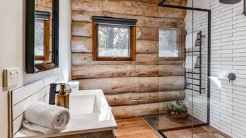 Shower, hair dryer, towels, toilet paper