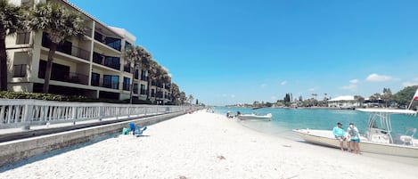 On the beach, sun loungers, beach towels