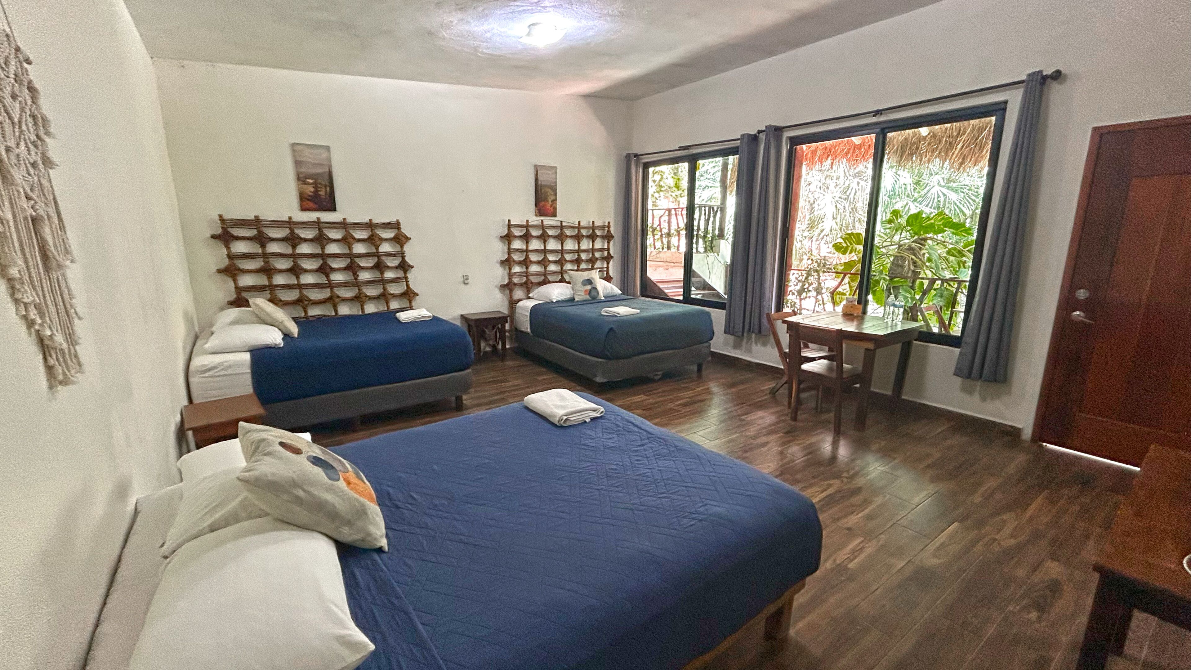 Exclusive Quadruple Room | Down comforters, minibar, free WiFi, bed sheets