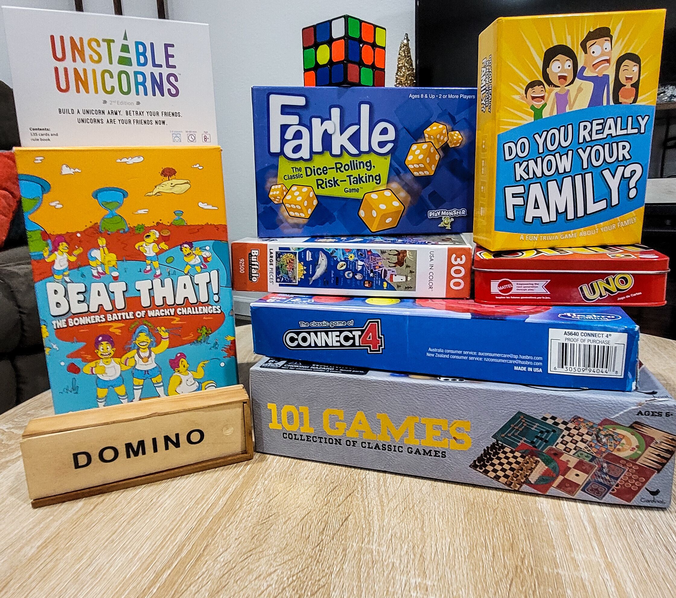 A variety of board games including 'Uno', 'Connect4', 'Farkle', 'Domino', 'Beat That!', 'Unstable Unicorns', and 'Do You Really Know Your Family?'.