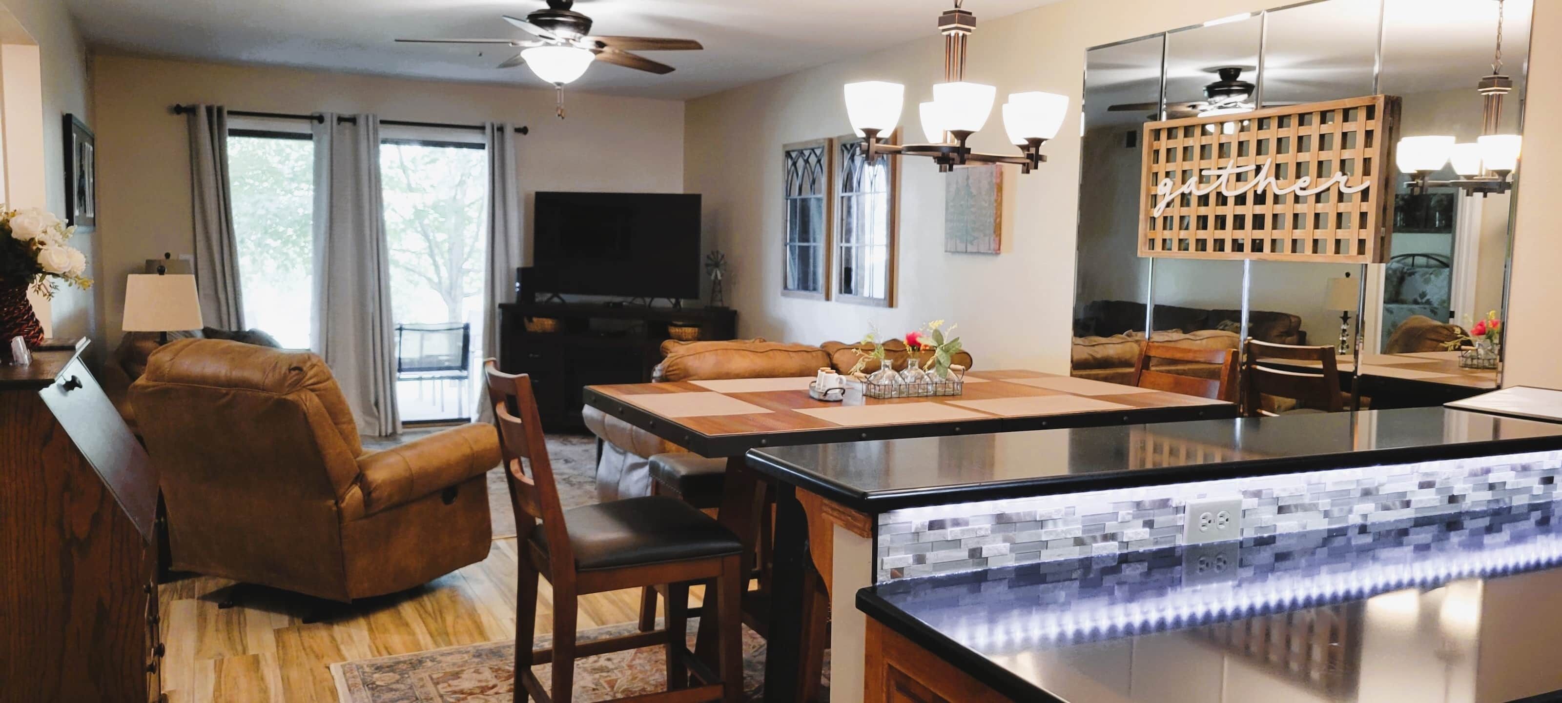 kitchen counter, dining area, living area plus patio!