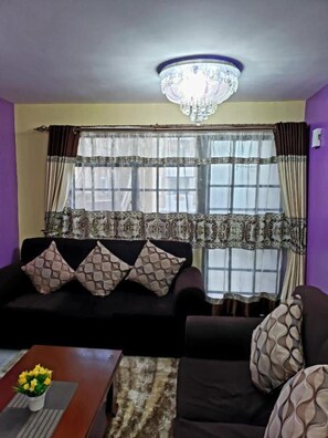 Living area - Stay.Plus Karibu Homes Apartment (Athi River)