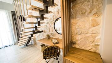 Luxury Loft | Living area | 32-inch Smart TV with satellite channels, TV