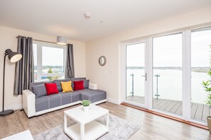 Apartment, Mehrere Betten | Wohnzimmer