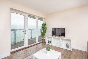 Apartment, Mehrere Betten | Wohnzimmer