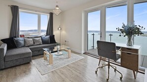 Apartment, Mehrere Betten | Wohnzimmer