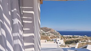 A white building with a view of a coastal landscape, including a mountain and the sea. - Villa Licata - 2BD, Luxury villa, near beach Elia (Elia)
