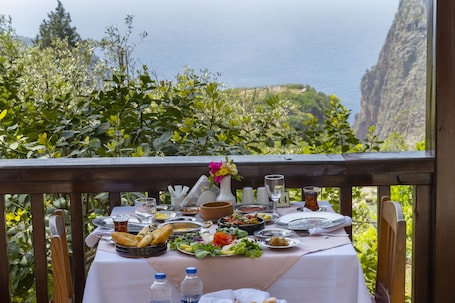 In-room dining. Watermill Villa & Hotel Faralya