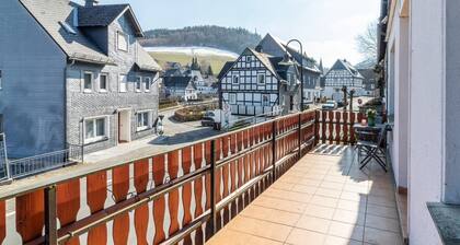 Spacious and modern vacation home with a beautiful view over the village, near Winterberg