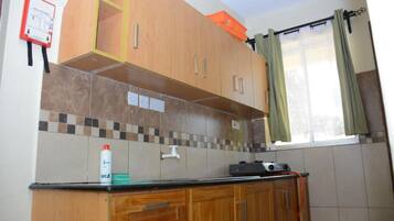 Apartment, 1 Bedroom | Private kitchen | Fridge, microwave, blender, cookware/dishes/utensils