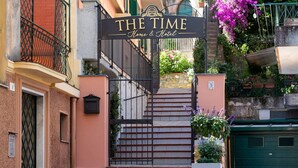 A hotel entrance with a sign reading "The Time Home & Hotel". - The Time Home&Hotel (Santa Margherita Ligure)