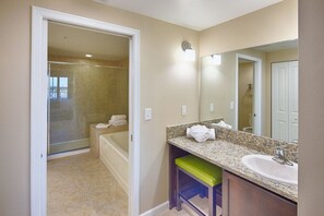 Bathtub, jetted bath, hair dryer, towels