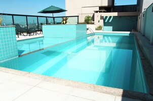 Indoor pool, open 10:00 AM to 7:00 PM, pool umbrellas, sun loungers