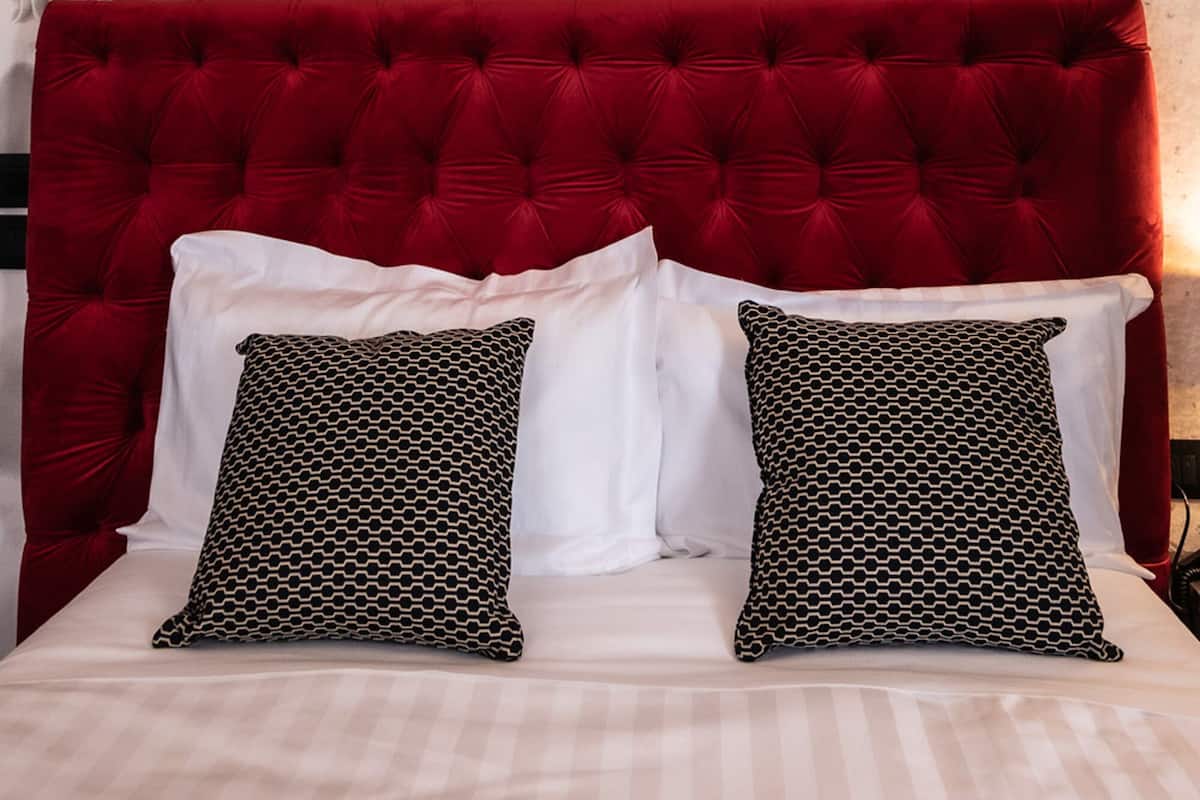 Premium bedding, down duvets, memory-foam beds, minibar