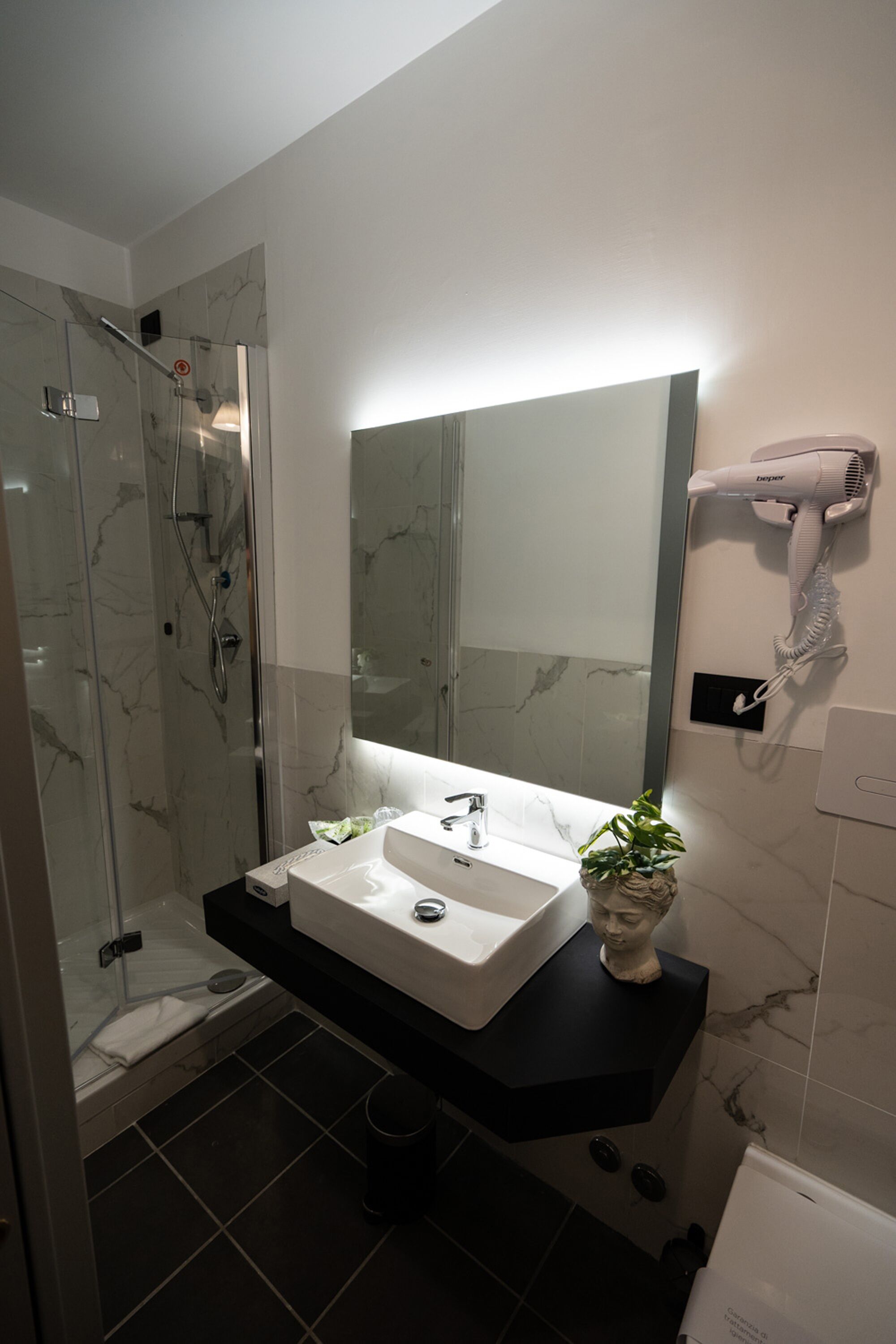superior room | bathroom | shower, rainfall showerhead, free toiletries, hair dryer