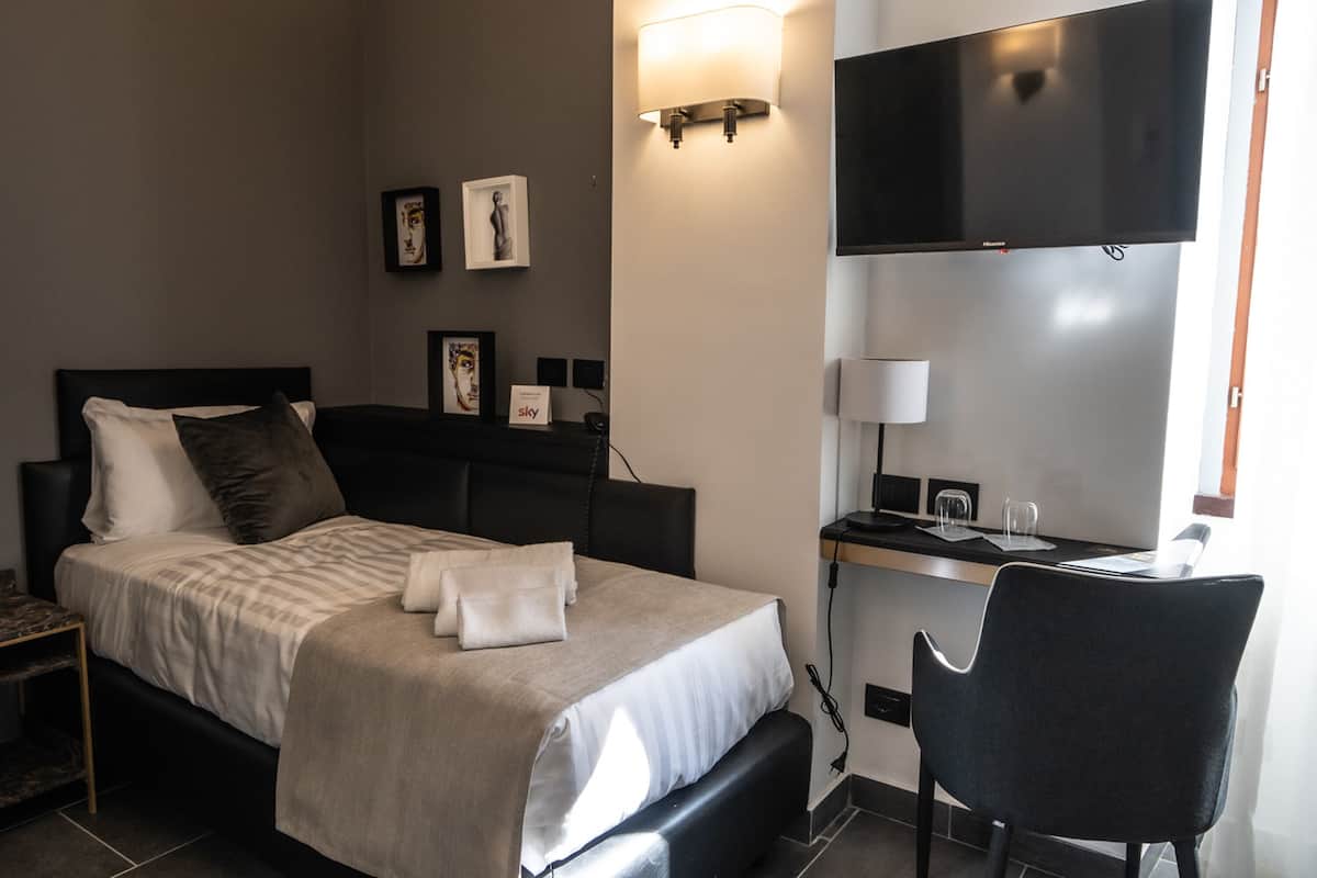 Premium bedding, down duvets, memory-foam beds, minibar