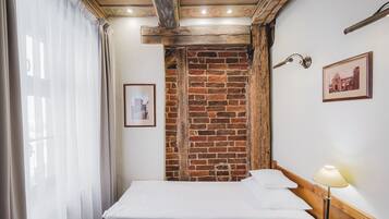 Habitación individual estándar | Tabla de planchar con plancha, wifi gratis y ropa de cama