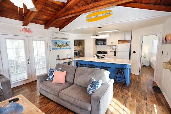Come relax in a cozy beach house 750 feet from the beach.