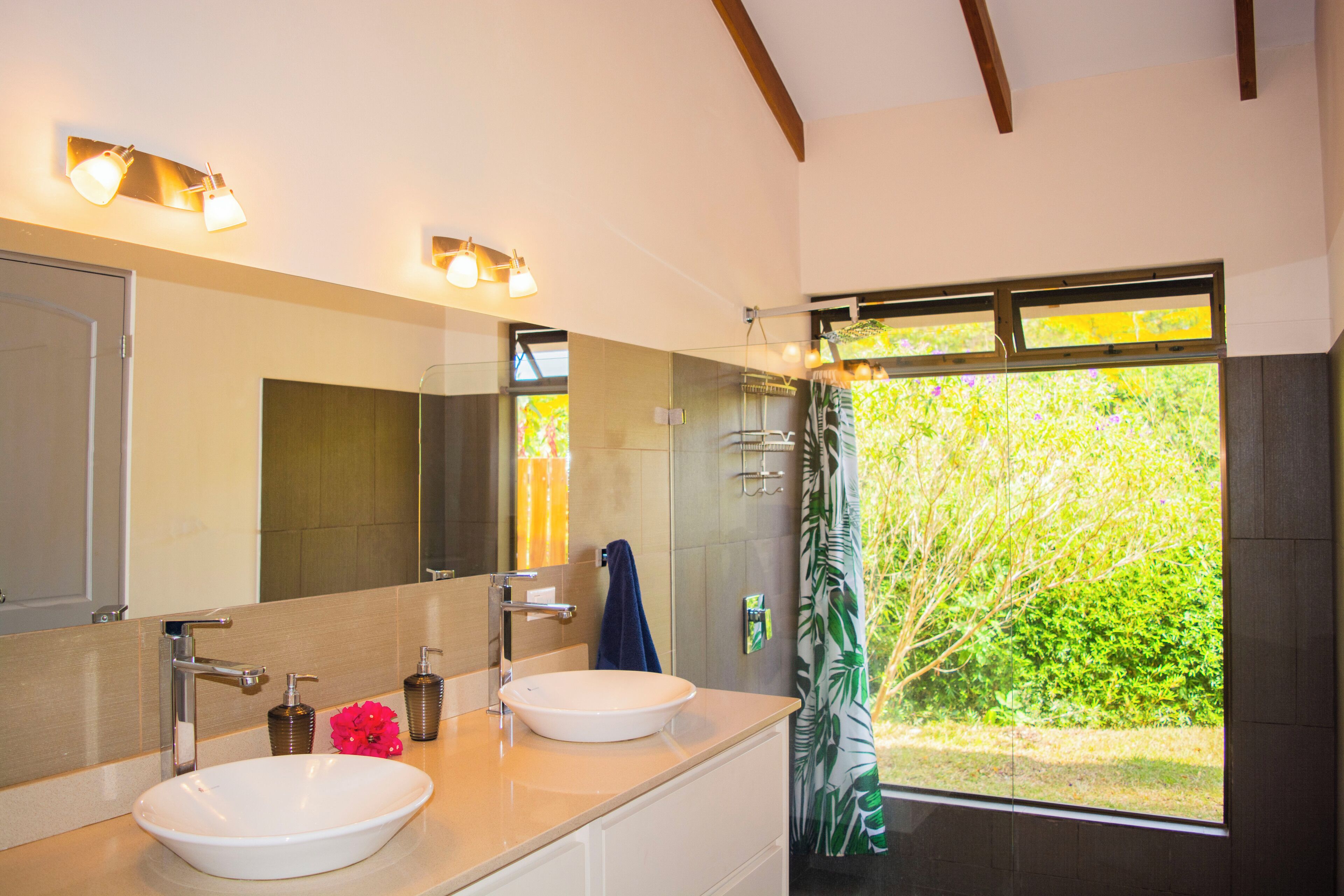 Shower, eco-friendly toiletries, hair dryer, towels