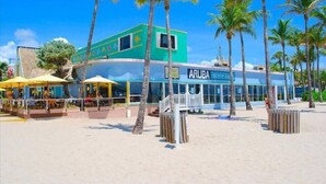 A beachside building with a sign reading "ARUBA". - Steps to Sand & Sea #3 (Lauderdale-by-the-Sea)