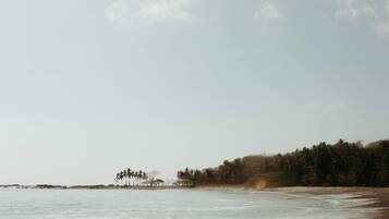 A la platja, tovalloles de platja i massatges a la platja