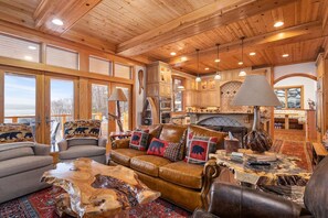 Living area - Luxury Torch Lake Vacation Home – Private Dock, Pickleball, Game Room, Theatre (Kewadin)