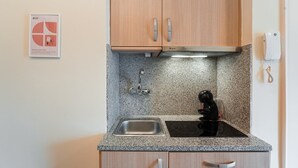 Coffee/tea maker, fridge, microwave, toaster