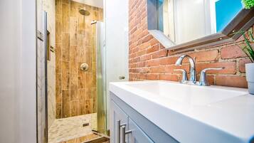 Bathtub, hair dryer, towels, soap