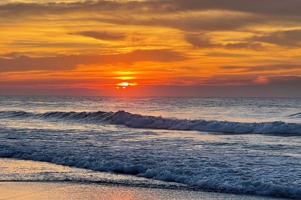 On the beach, sun loungers