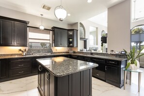 Private kitchen - Highly Rated Stunning Luxurious 4Br Mansion on River with heated pool & Spa!! (Ormond Beach)