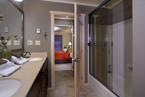 Combined shower/tub, hair dryer, towels, soap