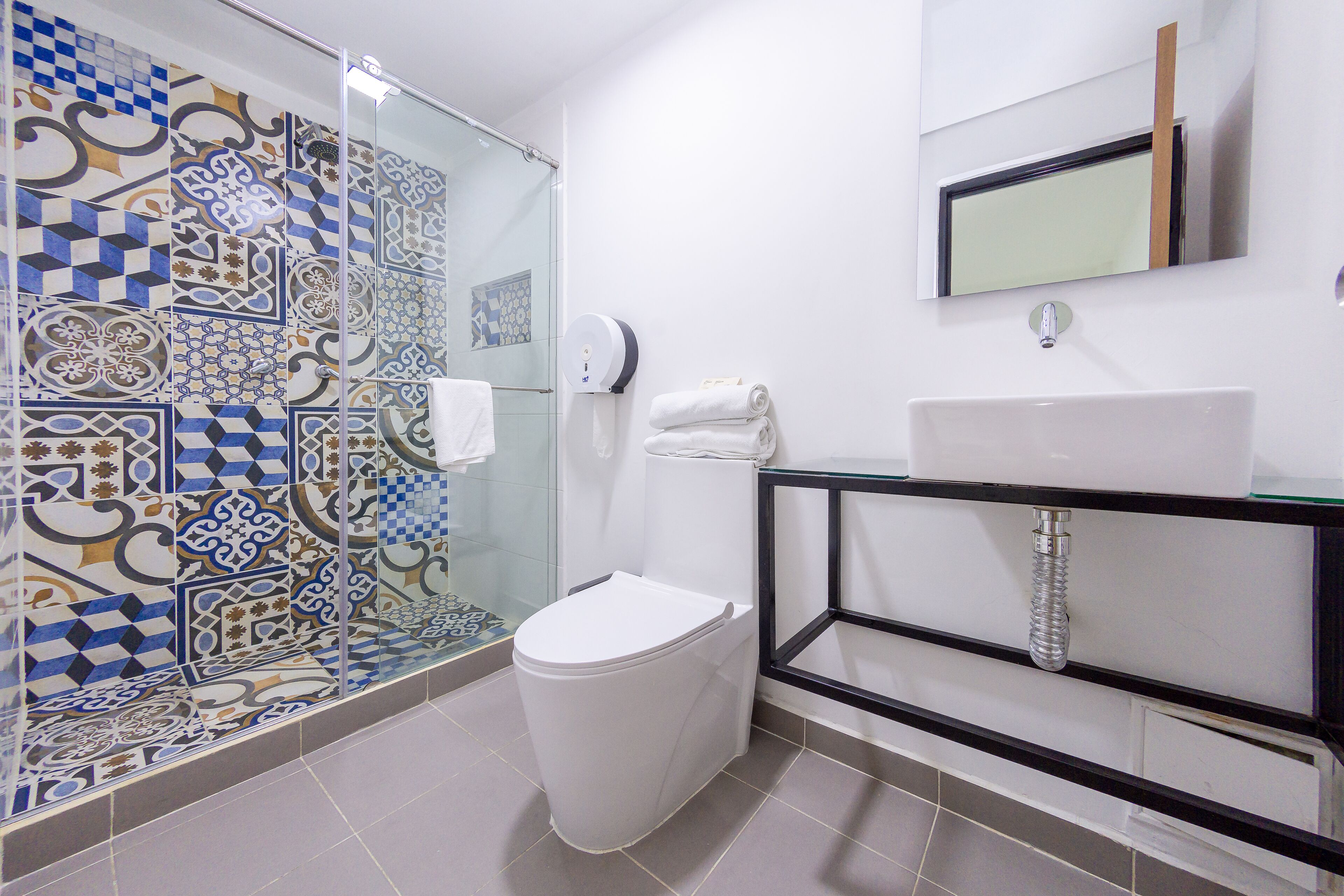 economy twin room | bathroom | shower, designer toiletries, towels, soap