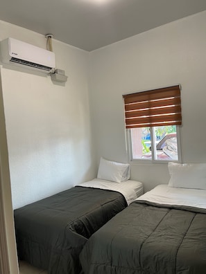 2 quartos, Wi-Fi de cortesia, roupa de cama