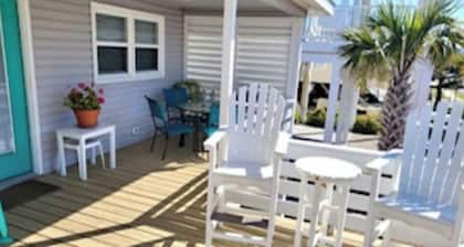 BEAUTIFUL 4BR/3BA BEACH COTTAGE STEPS AWAY FROM BEACH ACCESS.