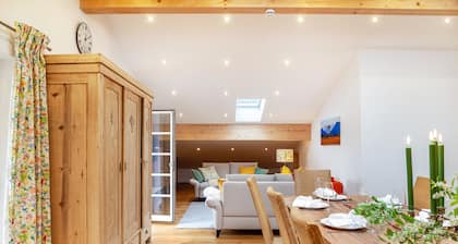 Ferienwohnung 'Xaver' mit Gemeinschaftsgarten, Balkon und WLAN