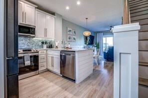 Fridge, microwave, dishwasher, coffee/tea maker