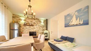 Apartment (Two Bedroom Apartment with Terrace) | Living room | TV - Apartments Ankica (Dobrinj)
