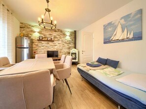 Apartment (Two Bedroom Apartment with Terrace) | Living room | TV - Apartments Ankica (Dobrinj)